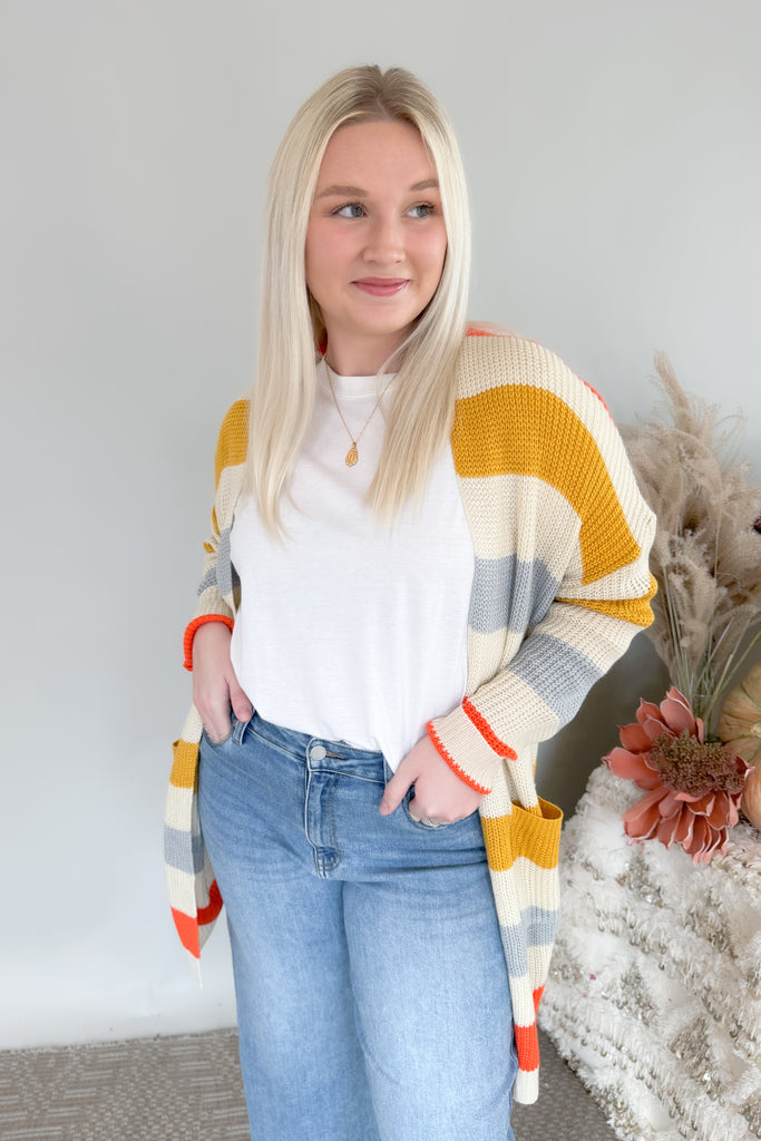 lightweight knit cardigan with yellow, orange, and blue stripes. Open front with side pockets by Newbury kustom