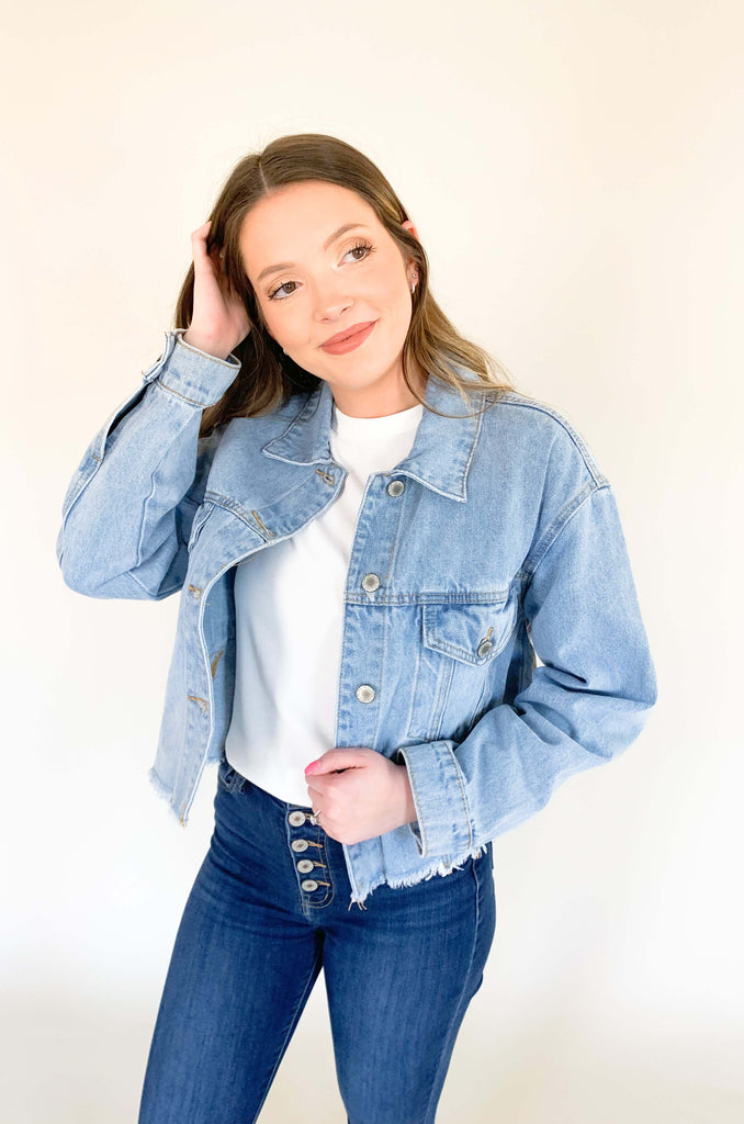 Feel like your best self while rocking this Dee Distressed Relaxed Denim Jacket! This fun denim jacket features long sleeves and a semi-cropped fit, plus raw hem details add a trendy touch to any outfit. It's the perfect weight that can be worn spring-fall, so you will get tons of wear out of it. With a look that's both stylish and comfy, you'll be ready to get go!