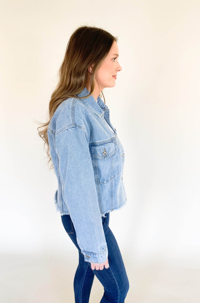 Feel like your best self while rocking this Dee Distressed Relaxed Denim Jacket! This fun denim jacket features long sleeves and a semi-cropped fit, plus raw hem details add a trendy touch to any outfit. It's the perfect weight that can be worn spring-fall, so you will get tons of wear out of it. With a look that's both stylish and comfy, you'll be ready to get go!