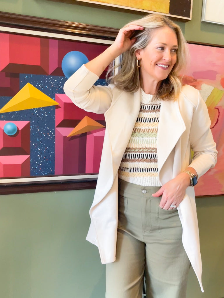 faux suede jacket that exudes sophistication with its collared details and drape front cut, while remaining lightweight and comfortable- available in ecru and dusty lavender