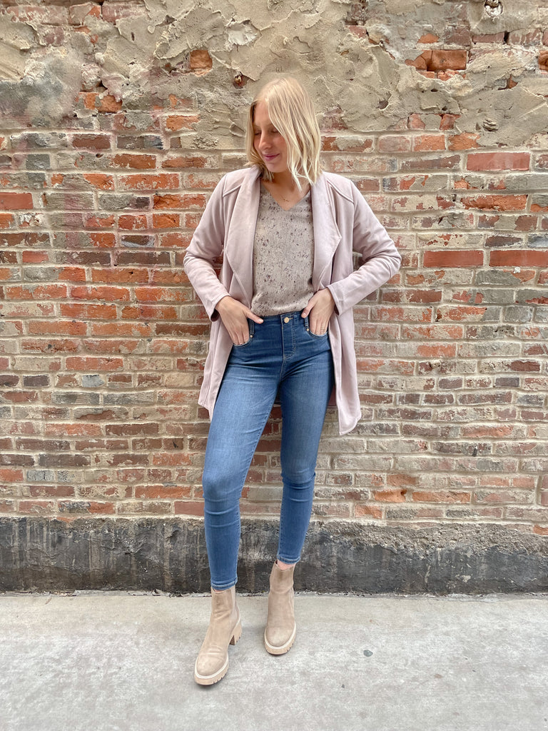 faux suede jacket that exudes sophistication with its collared details and drape front cut, while remaining lightweight and comfortable- available in ecru and dusty lavender