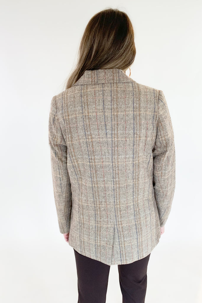 This Double Breasted Herringbone Blazer by Molly Bracken contains threads of mixed blue, mauve, and rust. The mixed colors are so unique, making it easy to match with multiple looks. We paired it with our new Dianne Lace Trim Satin Cami. Its lightweight lining adds softness and comfort, making it perfect for formal or everyday wear. 