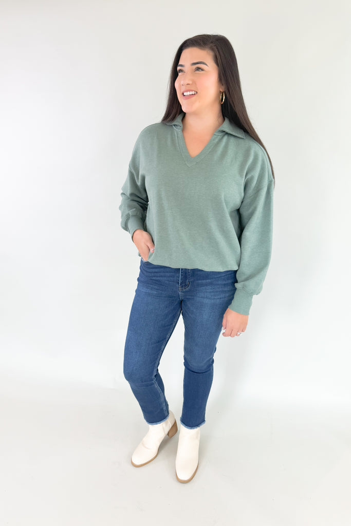 organic cotton soft fleece pullover with v neckline and collared details