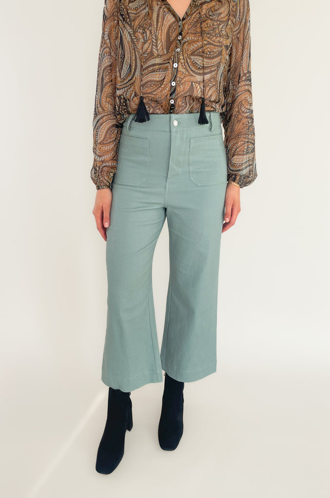 ultra high rise, wide leg colored pants with two front 70s inspired pockets- color sage