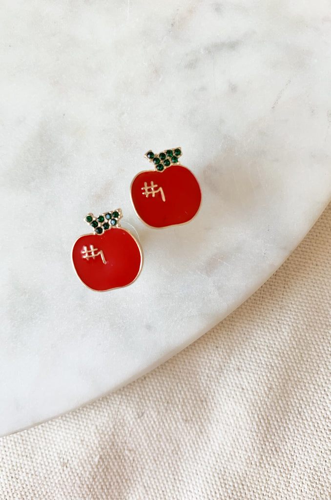 This earring is the apple of our eye- so fun and playful for back to school! These little cuties are sure to make a statement with their glossy studs finish and vibrant design. 
