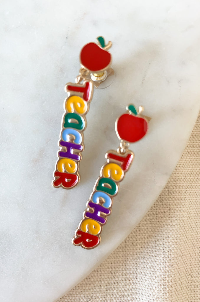 Show off your teaching spirit with these fun and unique enamel drop earrings! The bright and colorful design will be sure to draw attention, while the lightweight feel will make them comfortable to wear. An excellent way to show your support for the education in your life!