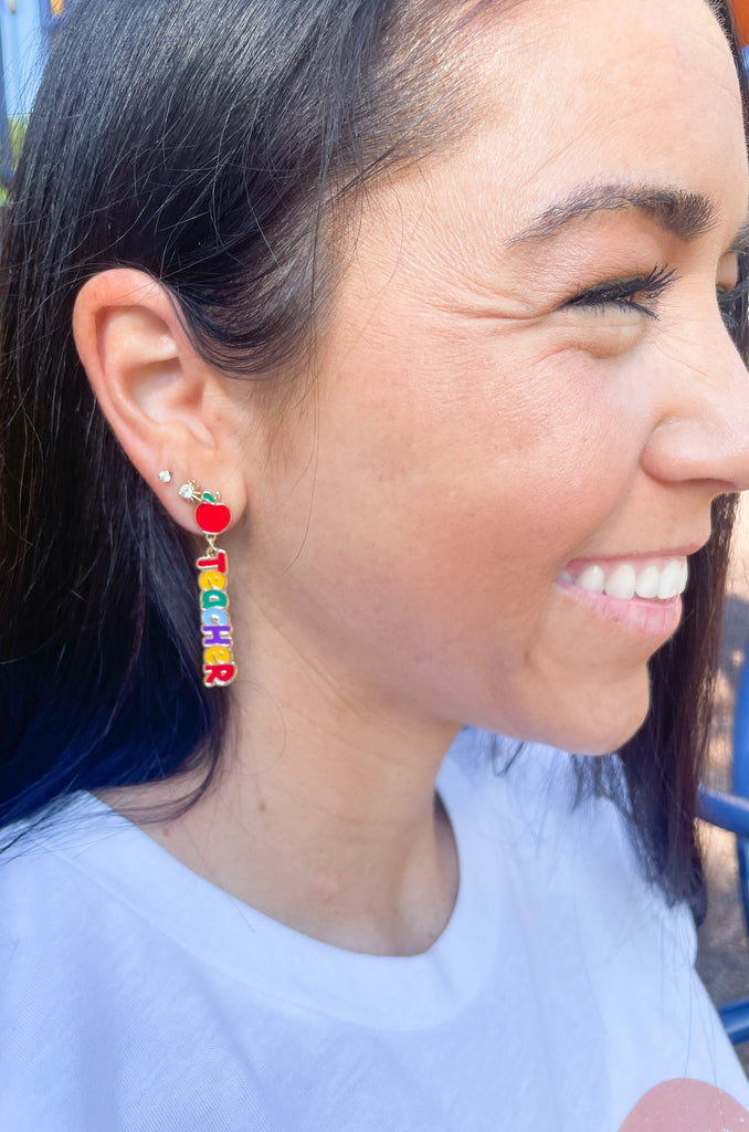 Show off your teaching spirit with these fun and unique enamel drop earrings! The bright and colorful design will be sure to draw attention, while the lightweight feel will make them comfortable to wear. An excellent way to show your support for the education in your life!