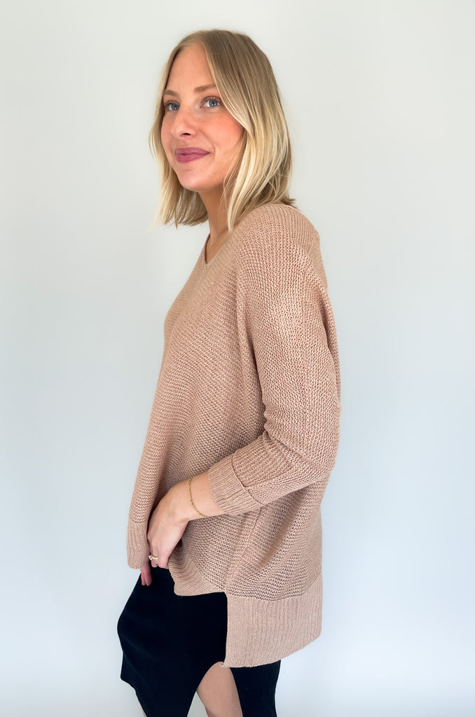 Look your best with the Ethel V Neck Sweater! Knitted from lightweight fabric, this stylish piece will keep you comfortable while making a statement. The v-neck cut adds a modern touch, Cuffed arms, and a flattering side slit ensures you can enjoy it all day long. It's oversized and so comfortable!