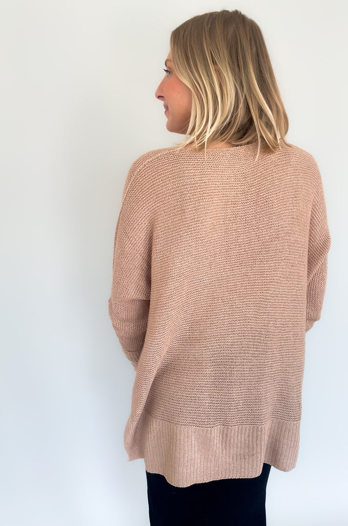 Look your best with the Ethel V Neck Sweater! Knitted from lightweight fabric, this stylish piece will keep you comfortable while making a statement. The v-neck cut adds a modern touch, Cuffed arms, and a flattering side slit ensures you can enjoy it all day long. It's oversized and so comfortable!