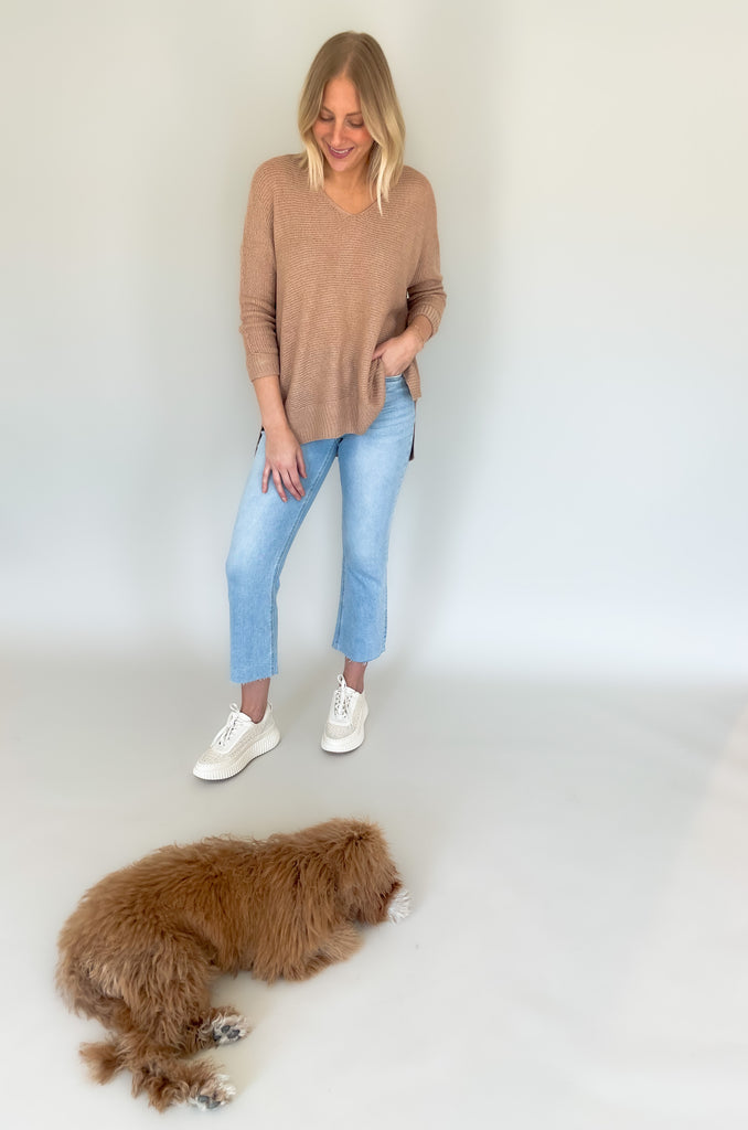Look your best with the Ethel V Neck Sweater! Knitted from lightweight fabric, this stylish piece will keep you comfortable while making a statement. The v-neck cut adds a modern touch, Cuffed arms, and a flattering side slit ensures you can enjoy it all day long. It's oversized and so comfortable!