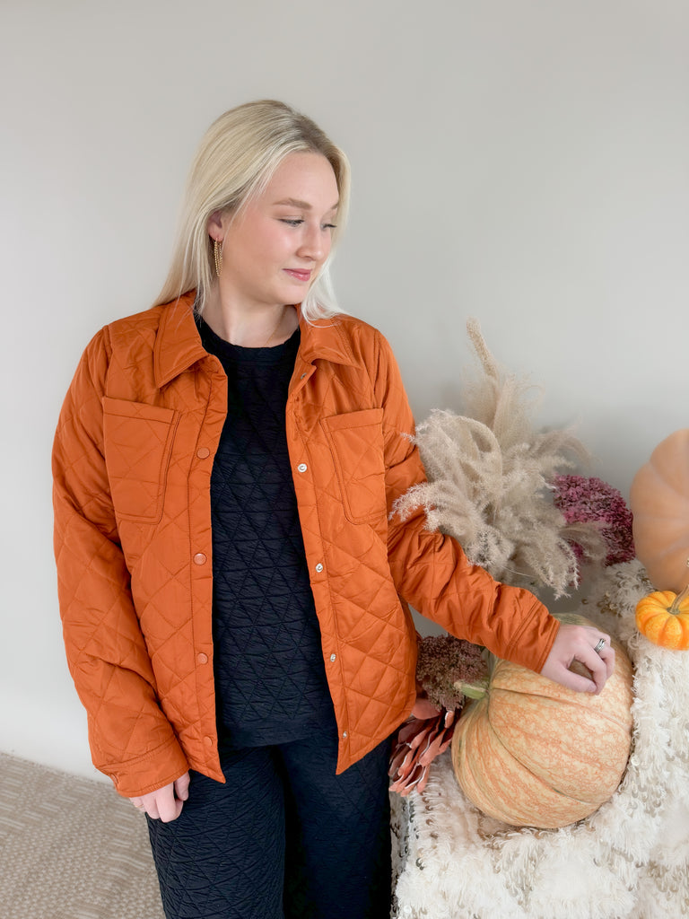 Stay comfortable and stylish in the Everly Snap Button Quilted Jacket! Crafted for medium to light-weight wear, this stylish copper jacket features a quilted design, snap front buttons, and two front pockets, plus additional side pockets for all your belongings.