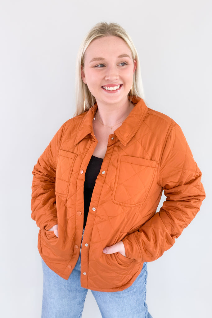 Stay comfortable and stylish in the Everly Snap Button Quilted Jacket! Crafted for medium to light-weight wear, this stylish copper jacket features a quilted design, snap front buttons, and two front pockets, plus additional side pockets for all your belongings.