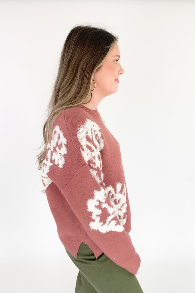 Be sure to turn heads this season with our Fabulous Floral Crewneck Sweater! Crafted from a super soft and stretchy fabric, you will be feeling cozy and warm. This fashion piece features a white contrast abstract floral stitching, creating a unique look. You can easily dress this sweater up or down for countless events! 