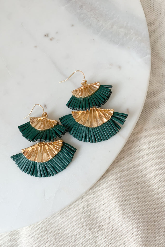 The most gorgeous earrings really do exist! Our new Fan Shaped Leather Tassel Earrings are absolutely stunning. They are elevated with a boho twist. We love the tiered fan shape and tassel details. 