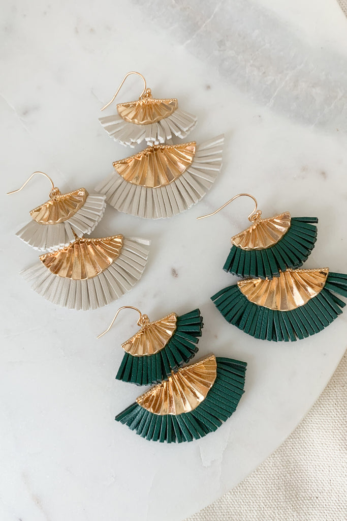 The most gorgeous earrings really do exist! Our new Fan Shaped Leather Tassel Earrings are absolutely stunning. They are elevated with a boho twist. We love the tiered fan shape and tassel details. 