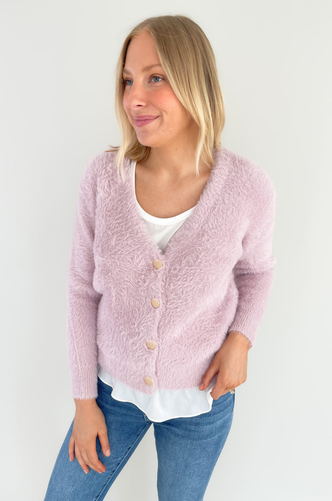 The Molly Bracken Flattering V Neck Eyelash Gold Button Cardigan is so pretty and timeless! Nothing says holiday like cute fuzzy sweater either. Both the mauve and cream colors are so pretty and add a dressy element to a cozy look. We also dressed them down with jeans. This style is ultra soft, stretchy, and very versatile. We love the unique gold button details too. 