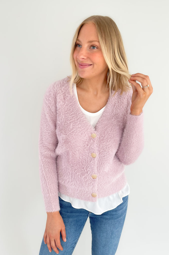 The Molly Bracken Flattering V Neck Eyelash Gold Button Cardigan is so pretty and timeless! Nothing says holiday like cute fuzzy sweater either. Both the mauve and cream colors are so pretty and add a dressy element to a cozy look. We also dressed them down with jeans. This style is ultra soft, stretchy, and very versatile. We love the unique gold button details too. 