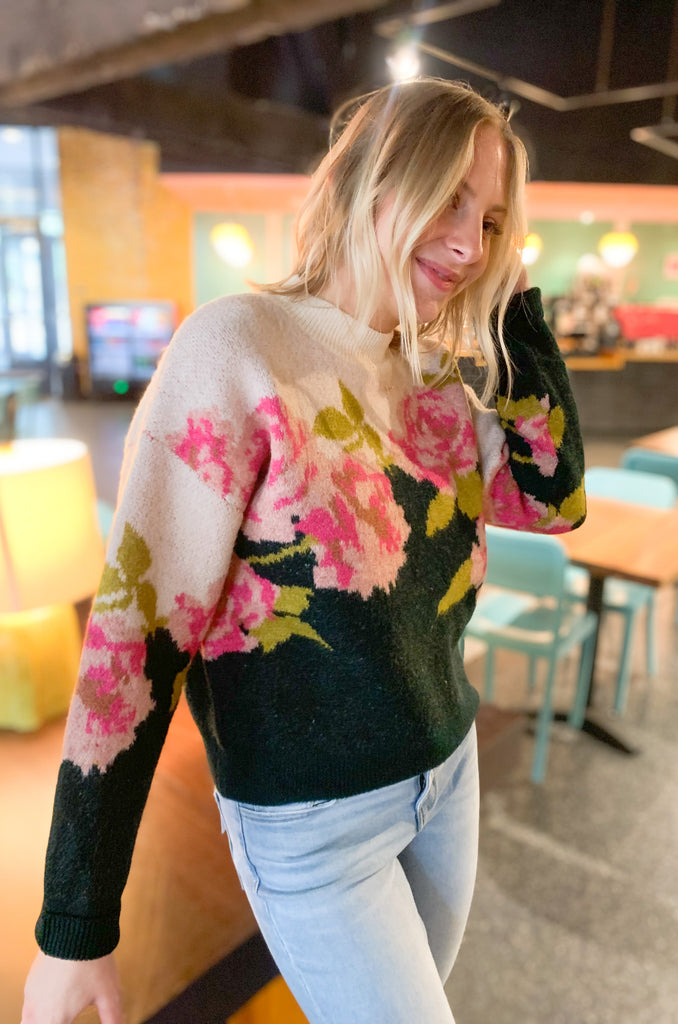 Stay warm and stylish in this Floral Print Colorblock Sweater! Crafted with a soft and cozy fabric, this sweater is perfect for chilly fall days. The unique color-blocking and floral print adds a special touch to your style.