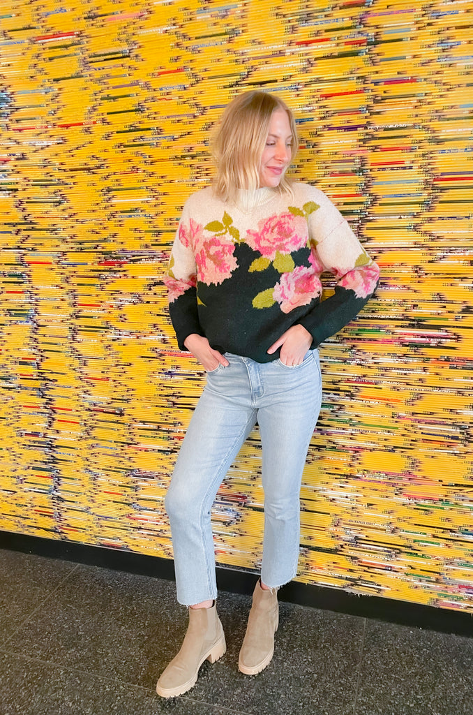 Stay warm and stylish in this Floral Print Colorblock Sweater! Crafted with a soft and cozy fabric, this sweater is perfect for chilly fall days. The unique color-blocking and floral print adds a special touch to your style.