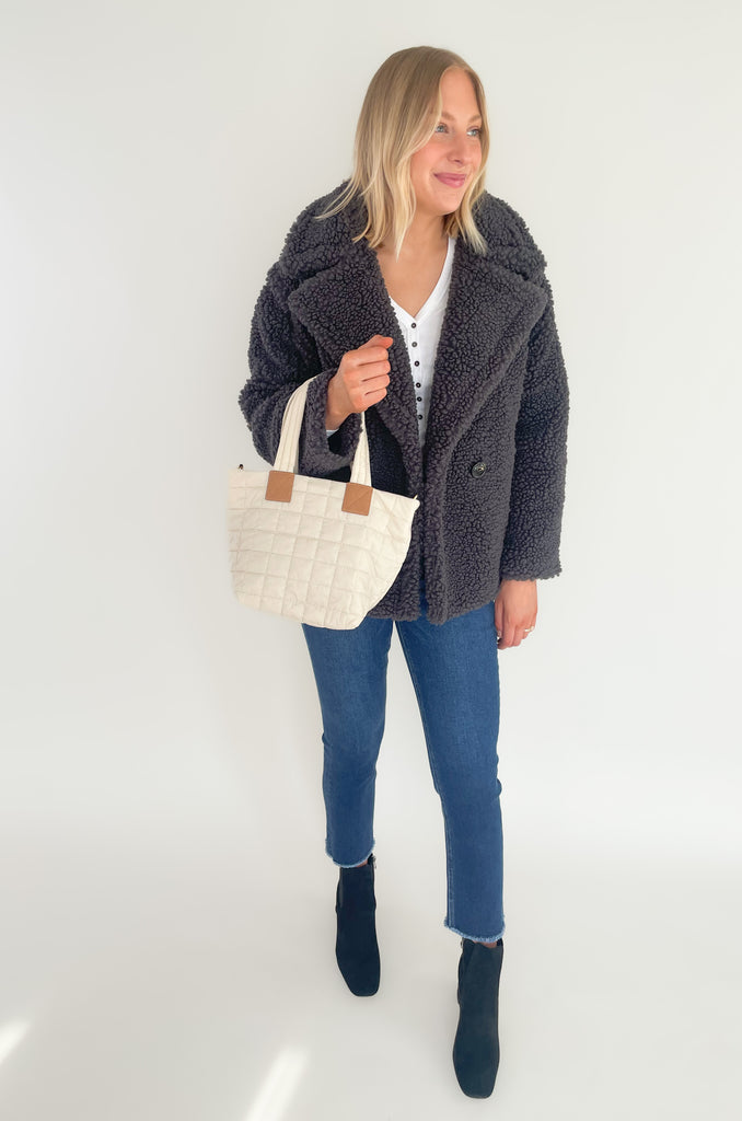 The UGG Gertrude Short Teddy Coat is a statement piece you can keep in your closet for years to come! It is incredibly soft with a double-breasted front, lots of texture, and incredible fit. This UGG style features faux fleece- offering warmth while feeling very light and comfortable.