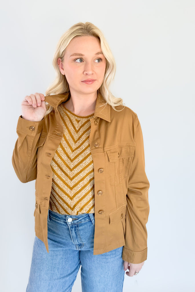 This beautiful Liverpool Gold Stripe 3/4 Sleeve Scoop Neck Top features a unique mitering detail on the front with a scoop neckline. The color and print is unique too. If you are looking of an elevated everyday favorite, this one is a great option. It pairs back to denim effortlessly!