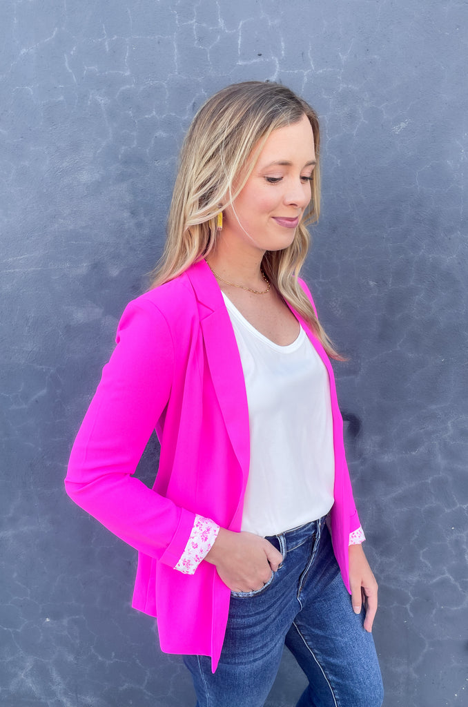 skies are blue long sleeve welt pocket blazer with silky floral or stripe printed lining. Available in hyper pink, Kelly green, or sun kissed orange.