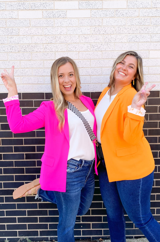 skies are blue long sleeve welt pocket blazer with silky floral or stripe printed lining. Available in hyper pink, Kelly green, or sun kissed orange.
