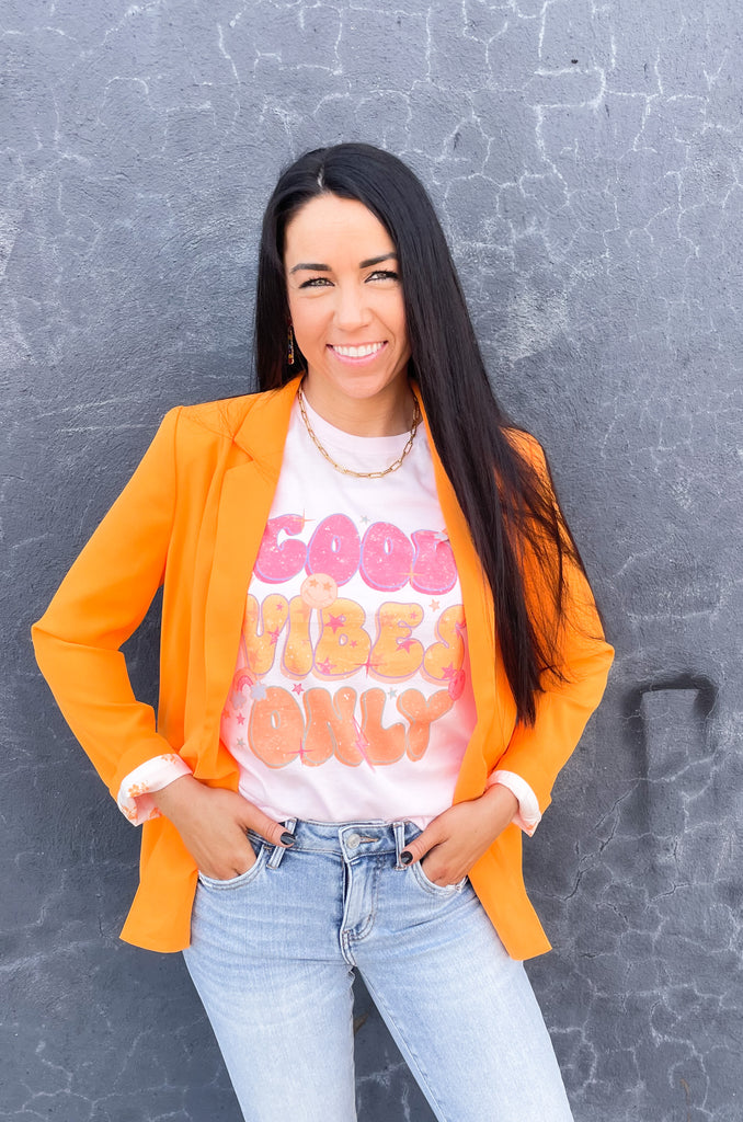 skies are blue long sleeve welt pocket blazer with silky floral or stripe printed lining. Available in hyper pink, Kelly green, or sun kissed orange.