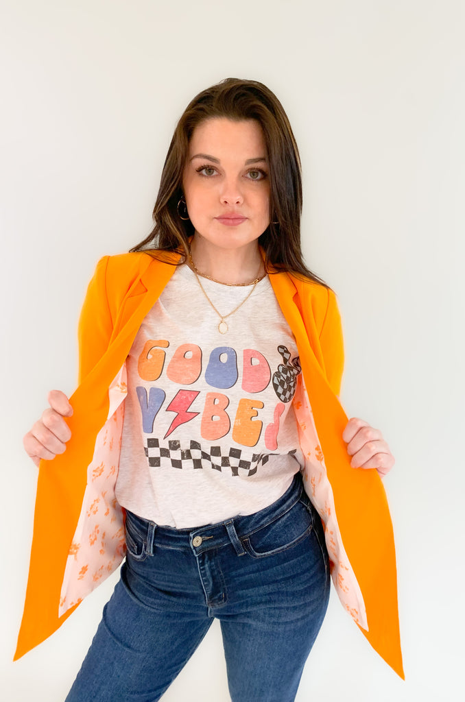 skies are blue long sleeve welt pocket blazer with silky floral or stripe printed lining. Available in hyper pink, Kelly green, or sun kissed orange.