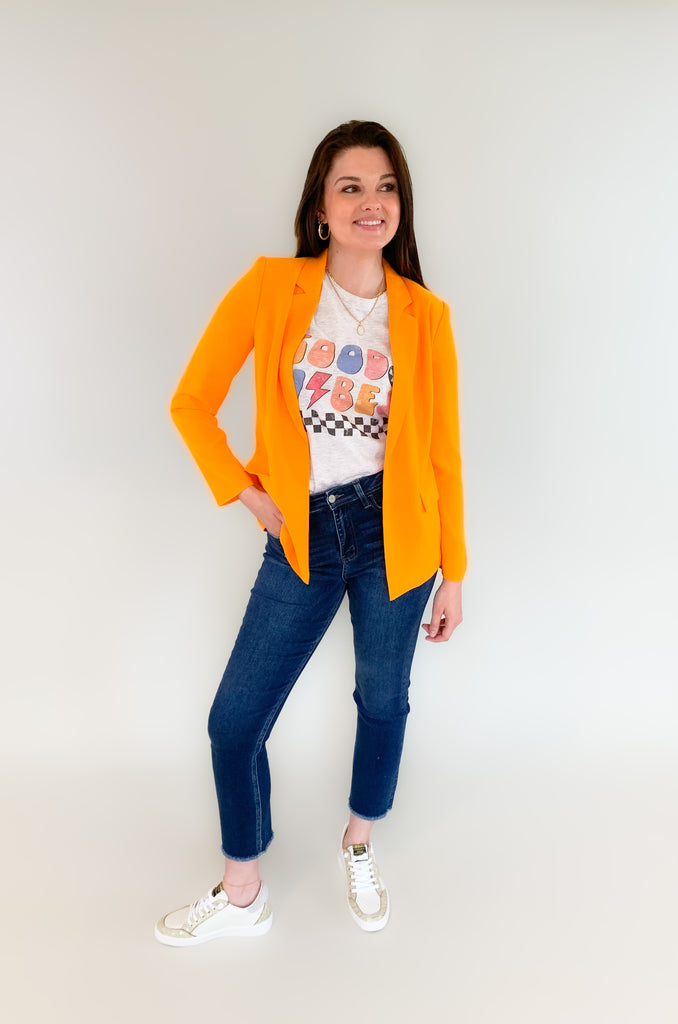 skies are blue long sleeve welt pocket blazer with silky floral or stripe printed lining. Available in hyper pink, Kelly green, or sun kissed orange.