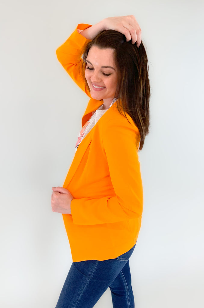 skies are blue long sleeve welt pocket blazer with silky floral or stripe printed lining. Available in hyper pink, Kelly green, or sun kissed orange.