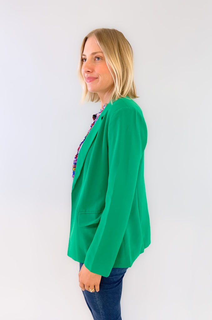 skies are blue long sleeve welt pocket blazer with silky floral or stripe printed lining. Available in hyper pink, Kelly green, or sun kissed orange.