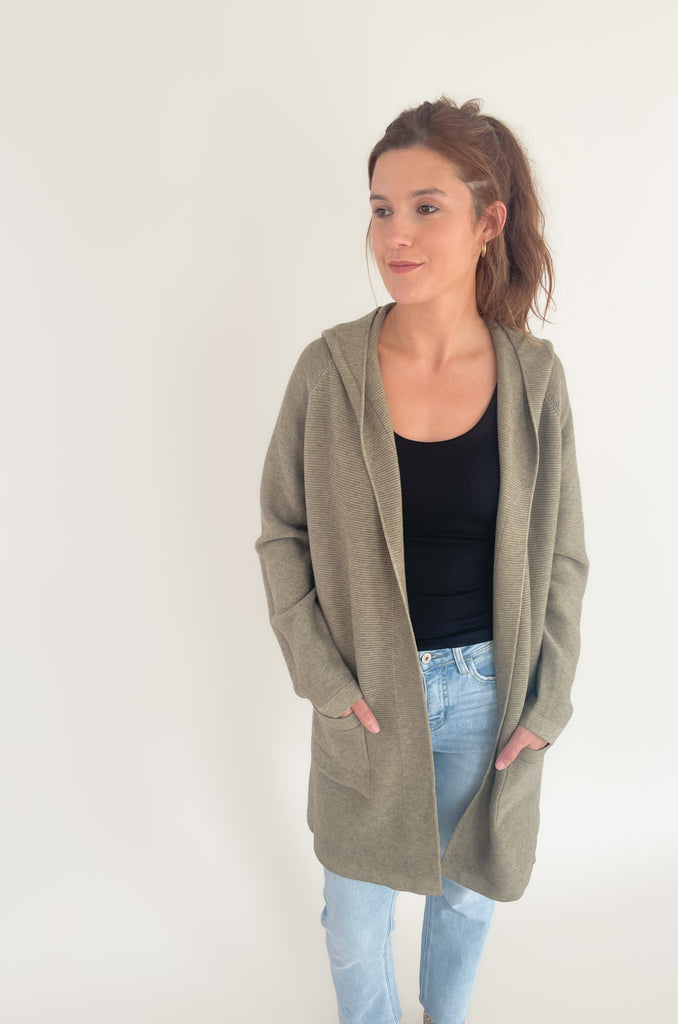 The Holly Hooded Duster is so comfortable and fun for fall! It has a unique ribbed knit texture, hood, side pockets, and elevated feel. If you love anything soft, this style is totally for you! We love layering it over a basic tank or tee to add a little oomf to any look. 