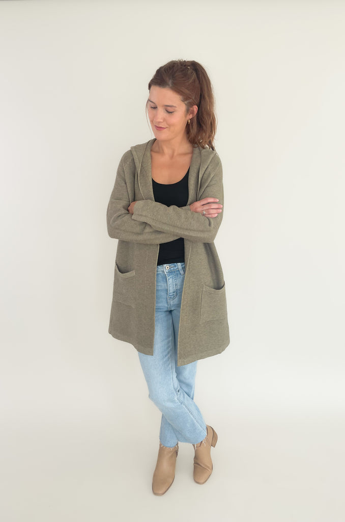 The Holly Hooded Duster is so comfortable and fun for fall! It has a unique ribbed knit texture, hood, side pockets, and elevated feel. If you love anything soft, this style is totally for you! We love layering it over a basic tank or tee to add a little oomf to any look. 