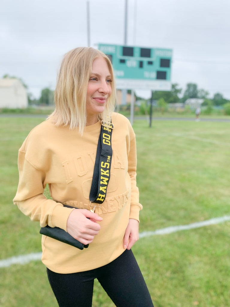 The U of I Vintage 81 Emboss Crewneck is designed with a fun, vintage-inspired look that's cute and cozy for game day! This classic crewneck features a raised embossed logo on the front that's so unique. You cannot find crewnecks like these just anywhere! Add some of our favorite Iowa accessories and you are ready for your next tailgate.