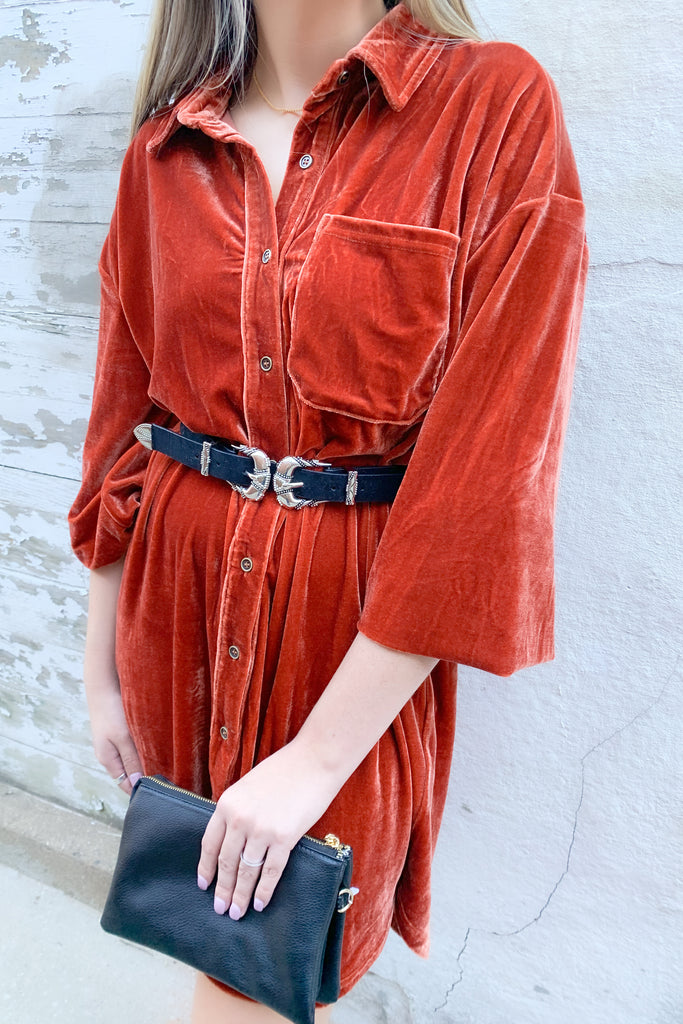 The Western Inspired Double Buckle Belt is super trendy with silver hardware. It adds a little edgy western flare to any look!