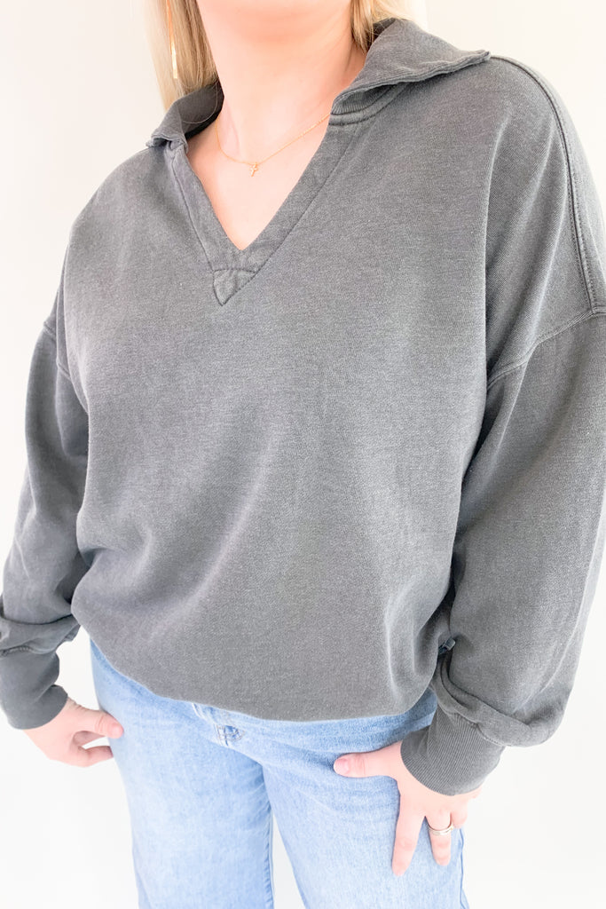 organic cotton soft fleece pullover with v neckline and collared details