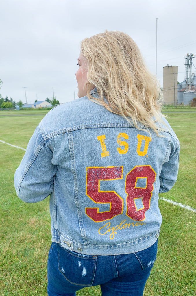 Stay warm and stylish on your next game day in this ISU Higgins Medium Wash Denim Jacket! Made from quality denim with "ISU Cyclones" printed on the back, this jacket is perfect for fans of all ages. Show off your school pride in this timeless classic for this tailgating season.