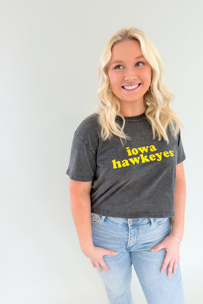 Show your Hawkeye pride with this vintage-style cropped tee! The yellow 70s-inspired text & lightweight feel will keep you looking good and feeling comfortable all day! It's perfect for any Hawkeye fan. 