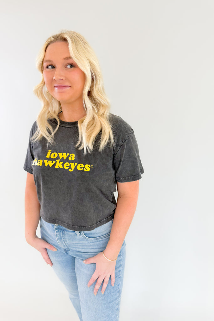 Show your Hawkeye pride with this vintage-style cropped tee! The yellow 70s-inspired text & lightweight feel will keep you looking good and feeling comfortable all day! It's perfect for any Hawkeye fan. 