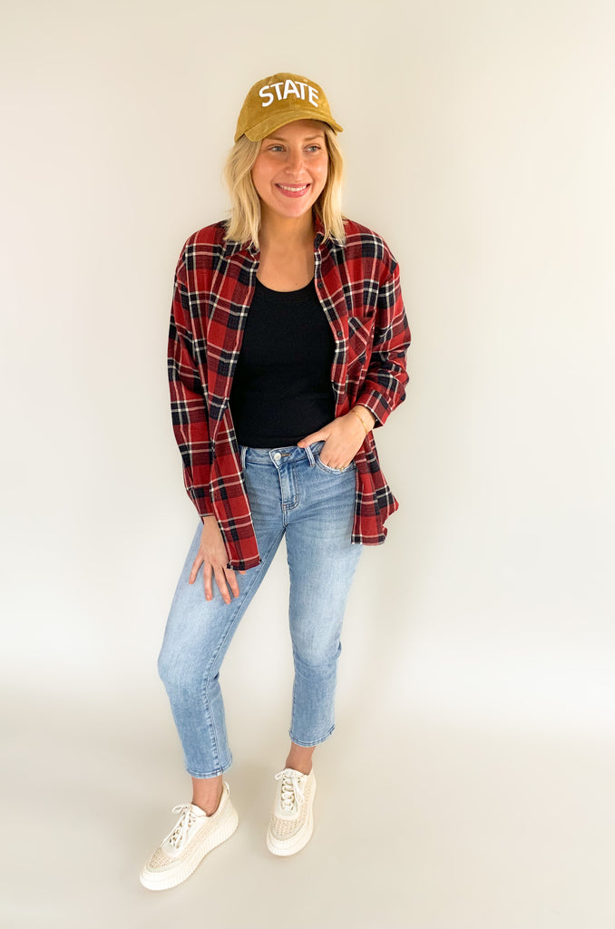 This Iowa State Mascot Oversized Plaid Flannel is a must-have for any Iowa Cyclones fan! It's crafted from a classic, cozy flannel material that's soft and elevated. The oversized  black and red plaid print screams game day fun! Plus, who doesn't love the iconic cyclone mascot on the back!?