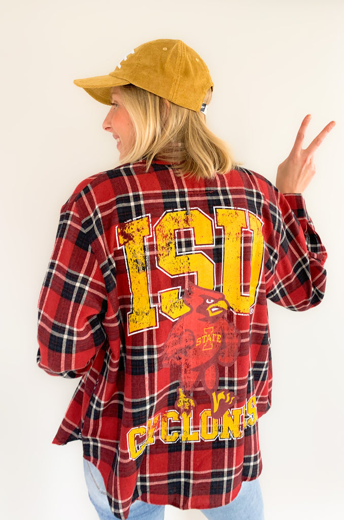 This Iowa State Mascot Oversized Plaid Flannel is a must-have for any Iowa Cyclones fan! It's crafted from a classic, cozy flannel material that's soft and elevated. The oversized  black and red plaid print screams game day fun! Plus, who doesn't love the iconic cyclone mascot on the back!?