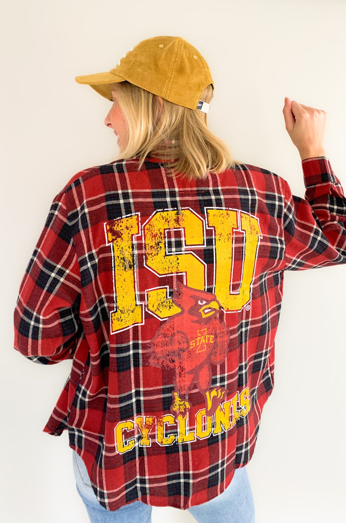 This Iowa State Mascot Oversized Plaid Flannel is a must-have for any Iowa Cyclones fan! It's crafted from a classic, cozy flannel material that's soft and elevated. The oversized  black and red plaid print screams game day fun! Plus, who doesn't love the iconic cyclone mascot on the back!?