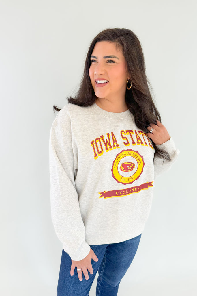 The Iowa State Old School Crew Sweatshirt is the ultimate combination of vintage style and comfort! Enjoy a cozy fleece interior and an eye-catching Iowa State logo in vintage lettering on the front. Show off your Cyclone pride with this unique sweatshirt, or gift one to your favorite alumni!