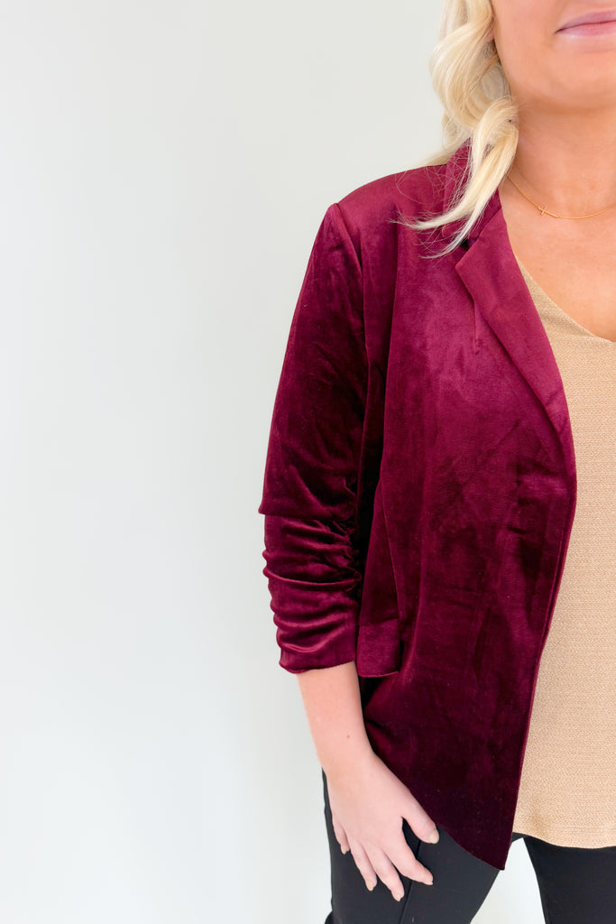 The Iris Velvet Blazer is a must-have! It is perfect for making a statement and hits the 70s trend we cannot get enough of this year. All of the details elevate this style. Although it is a fitted blazer, it is very stretchy and comfortable. The inside of each blazer has a stunning satin-like fabric with a floral design. It also has ruched 3/4 length sleeves and faux pockets. The Iris is timeless and truly a wow-piece! 