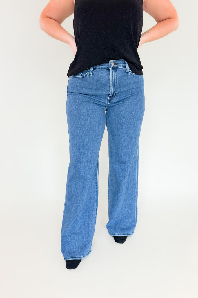 Our Jack Medium Wash Palazzo Jean is the perfect jean for any occasion! With an ultra high rise, 70s inspired wash, and a super long and stretchy fit, you'll feel confident and cozy all day. You cannot go wrong with this quality!