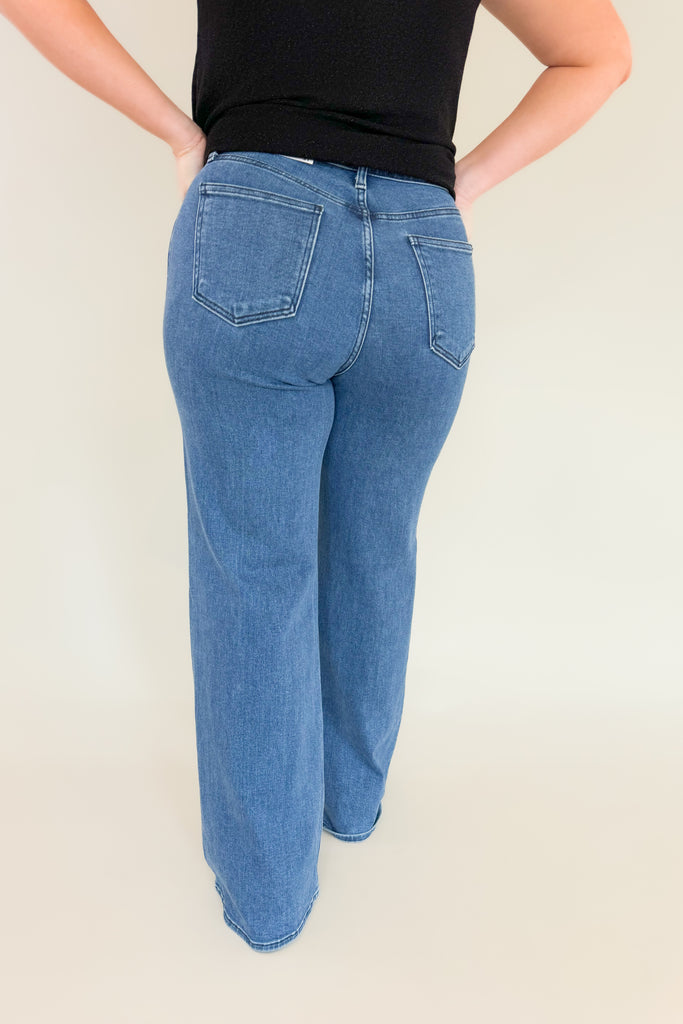 Our Jack Medium Wash Palazzo Jean is the perfect jean for any occasion! With an ultra high rise, 70s inspired wash, and a super long and stretchy fit, you'll feel confident and cozy all day. You cannot go wrong with this quality!