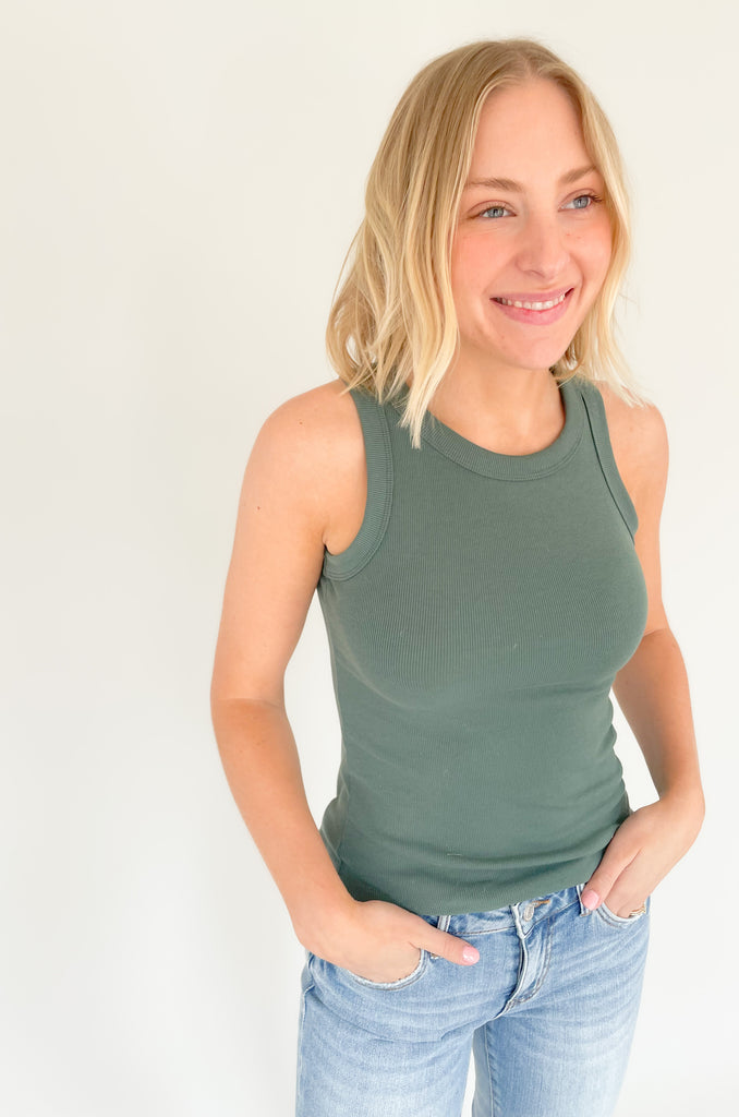 round neck fitted rib tank with plenty of stretch. Available in several colors, including green, sage, teal, black, ivory, brown, and oatmeal
