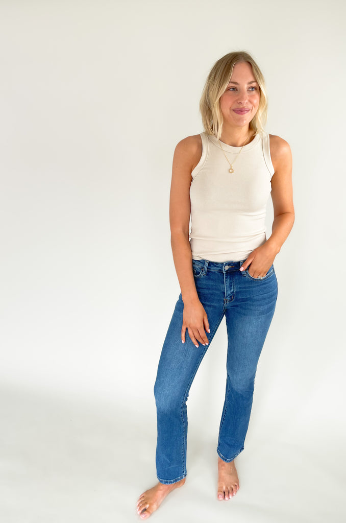 round neck fitted rib tank with plenty of stretch. Available in several colors, including green, sage, teal, black, ivory, brown, and oatmeal