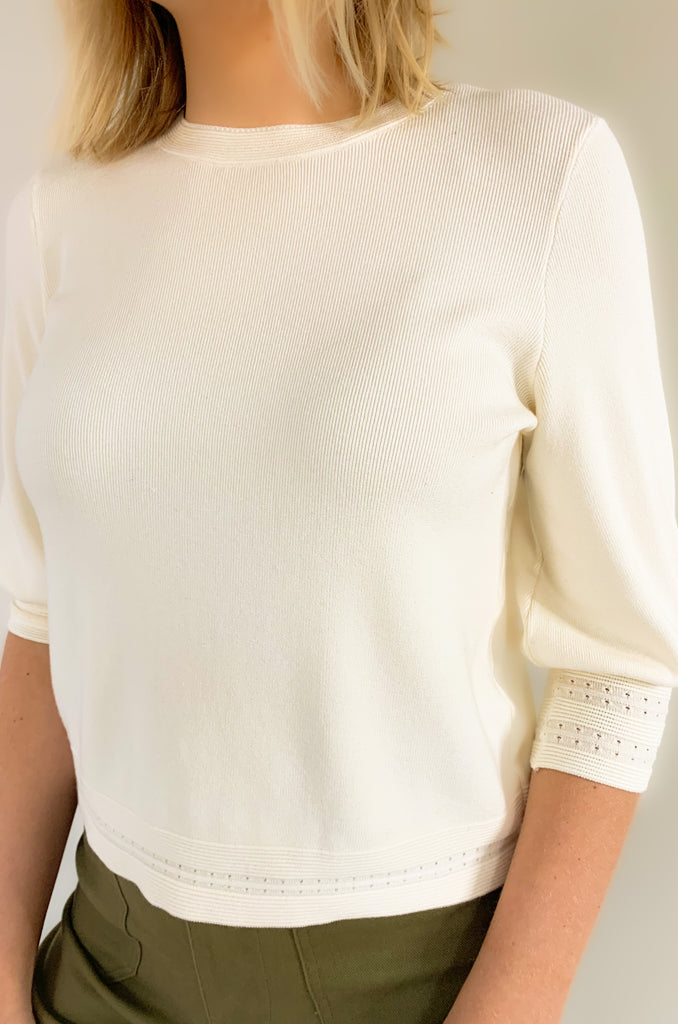 The Jules 3/4 Sleeve Sweater is perfect for any day! It's elevated and classic, making it a great option to wear on its own, or with layers. The soft knit fabric and crochet detail around the cuffs gives it a beautiful and stylish look. Available in ivory and rosewood, this lightweight sweater a great addition to any wardrobe!
